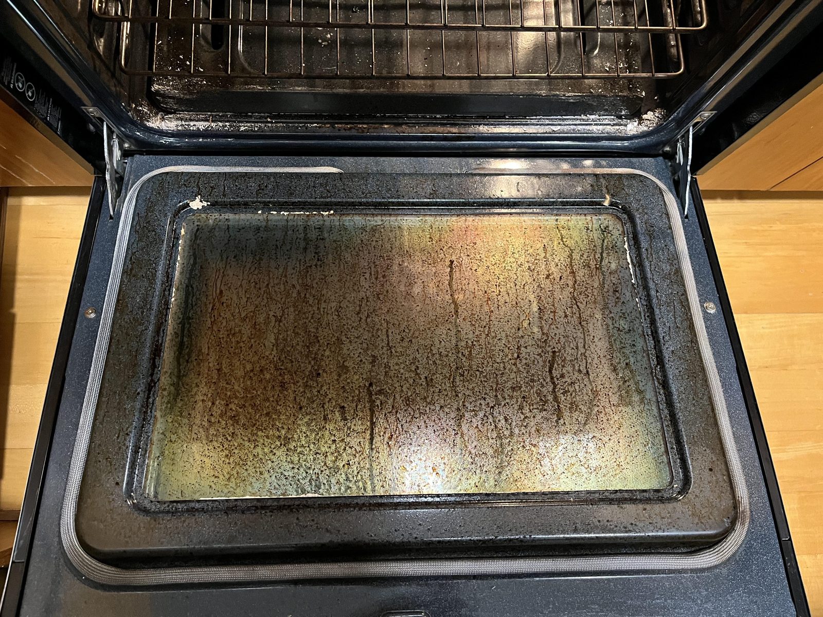 Self-cleaning oven reset before
